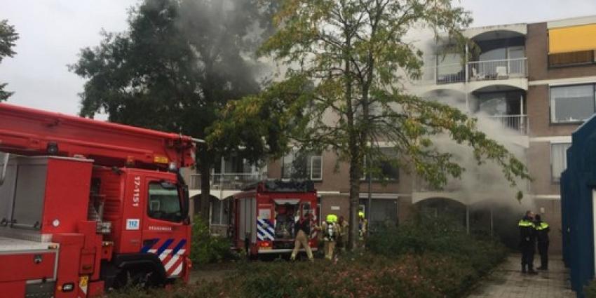 Middelbrand door brand in container