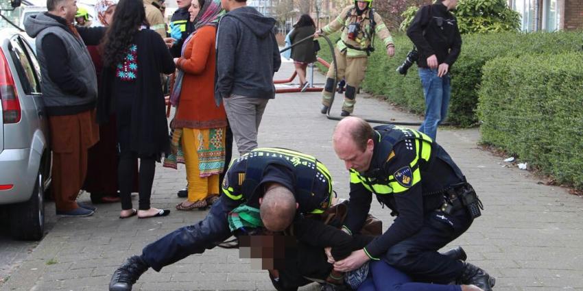 Vrouw aangehouden bij woningbrand in Schiedam Vrouw aangehouden bij woningbrand in Schiedam