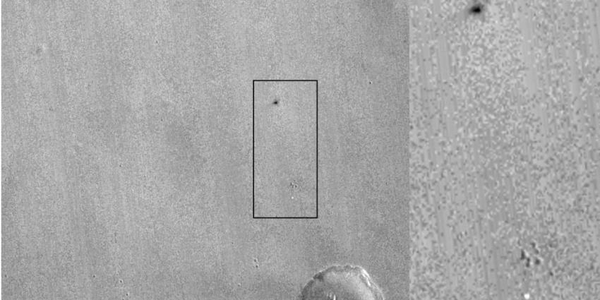 Marslander in duizenden stukken uiteen gespat Marslander in duizenden stukken uiteen gespat
