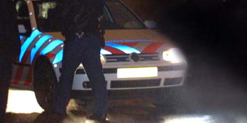 Foto van politieauto in donker | Archief EHF Foto van politieauto in donker | Archief EHF