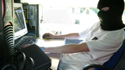 Hacker achter computer Hacker achter computer