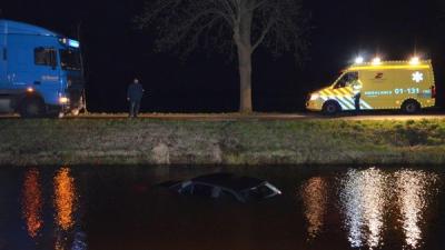 Auto te water in Muntendam