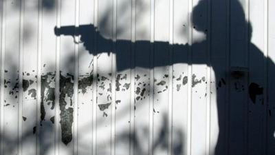Foto van man met geweer | Archief FBF.nl Foto van man met geweer | Archief FBF.nl