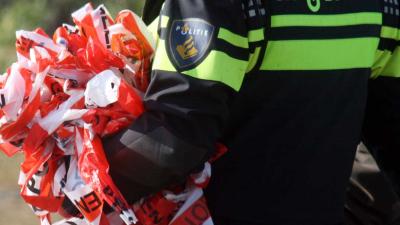 Agent met afzetlint Agent met afzetlint
